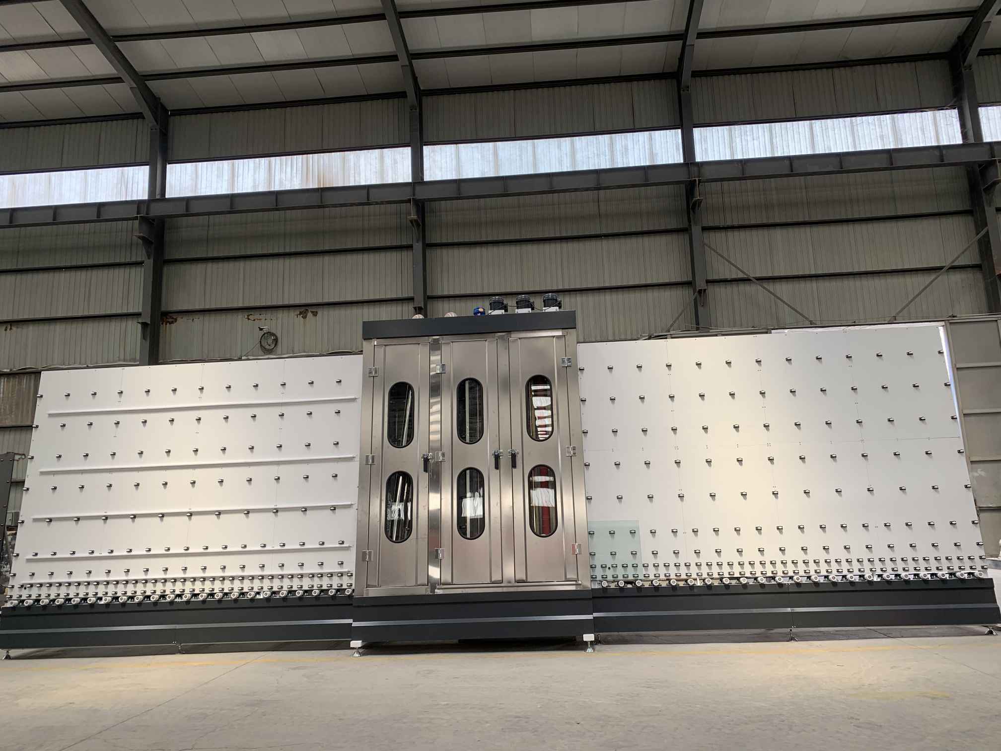 Vertikal glastvättmaskin